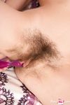 18-Year-Old Brunette Mia Moans as She Fucks Herself with a Purple Toy