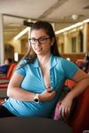 Beautiful, nerdy teen Monica flaunts her tight, college girl pussy in the library.