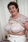 Mature BBW Carol Gets Freaky with Her Huge Tits on a Dining Table