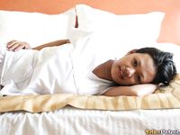 Filipino Caregivers Joanna and Joy Pose in Bed in Their White Uniforms 
Hot Filipino Nurses Joanna and Joy in White Uniforms on Bed