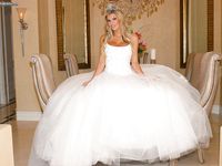 Beautiful Bride Kendall Brooks Jumps in Wedding Dress with Plentiful Cleavage
Seductive Bride Kendall Brooks Flaunts Ample Cleavage in Wedding Gown