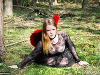 Amateur Babe in Cosplay Poses in the Forest