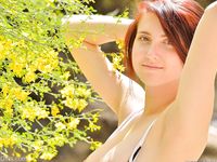 Charming Amateur Babe Lexi Poses Half-Naked and Teases Her Big Tits in Public.