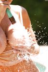 Sexy Jamie tightens her natural cock and gets her pipes cleaned by the poolside