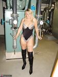 Mature Blonde Sweet Susi Poses Nude in OTK Boots in an Industrial Setting. 
Sultry Mature Sweet Susi Strips Down in OTK Boots at Work.