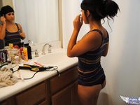Layla Rose strips down to reveal her big tits and tight ass in the bathroom.