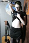 Gothic Babe Rubella Strips to Reveal Soft Body and Plump Boobs