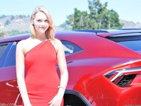 Slim, cute Jessica strips off her red dress and flaunts her sexy tits.