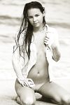 Bare Aria Poses Nude on Sandy Beach, Showing Off Sexy Tan Skin