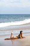 Bare Aria Poses Nude on Sandy Beach, Showing Off Sexy Tan Skin