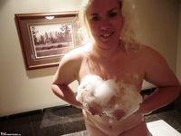 Blonde Barby Soaps Up Her Big Boobs While Bathing