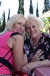 Blonde MILF Melody and Lesbian Babe Get Steamy on the Terrace