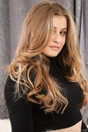 Long-Haired Princess Lucy Ava Poses Provocatively in Stockings and Panties