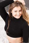 Long-Haired Princess Lucy Ava Poses Provocatively in Stockings and Panties