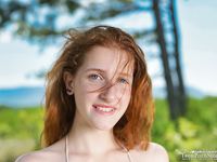 Foxy Lee, Natural Redhead, Fondles Herself on a Log Bench