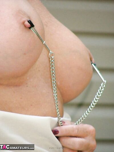 Mature Lady Adonna Enjoys Torturing Her Pierced Pussy and Sexy Nipples Outdoors