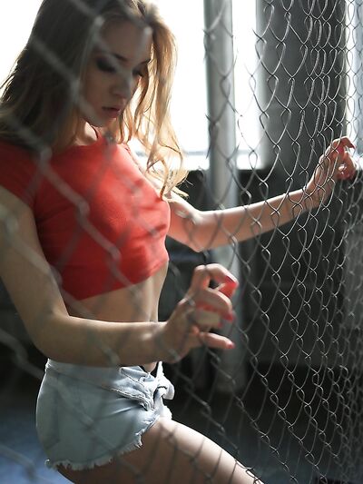 Sexy Meosy with Small Perky Tits Poses Erotically with a Motorcycle