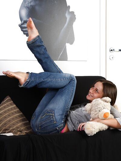 Cheerful Teen Ira Strips Down to Show Off Tight Ass and Shaved Pussy