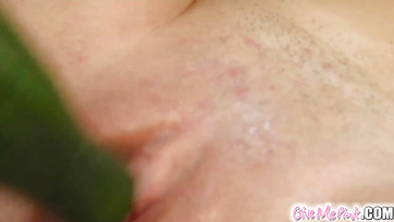 Lonely Babe Masturbates with a Large Cucumber