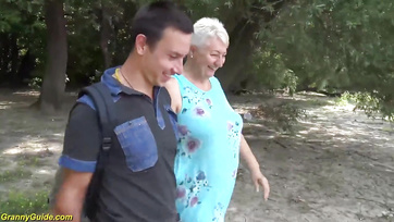 69-Year-Old Granny Sucking Cock by the Water's Edge After a Dip