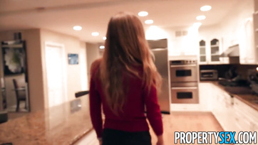 Sexy real estate agent babe in skirt and thigh highs