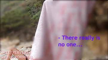 A petite girl jerks off a kinky guy at the beach
