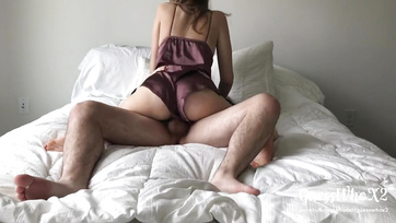 Moaning as she bounces on the giant cock