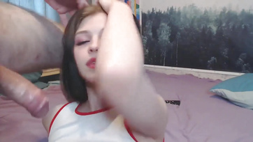 Beautiful-faced cutie gets a blowjob and facial cumshot