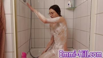 Skinny Small-Tit Babe Gets Turned on in the Shower and Starts Masturbating with Spread Legs